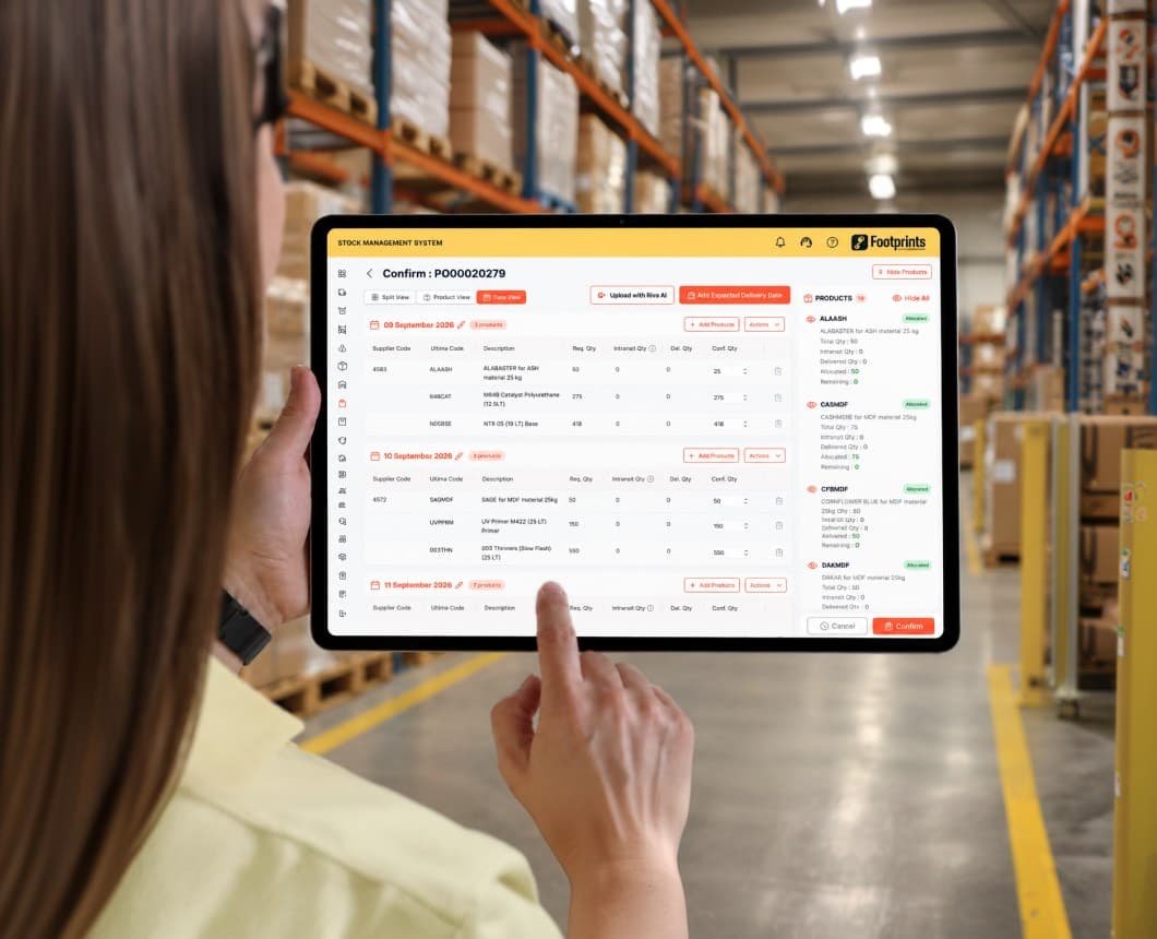 A woman in a warehouse aisle holding a tablet, confirming purchase order PO00002279 against a list of products and quantities